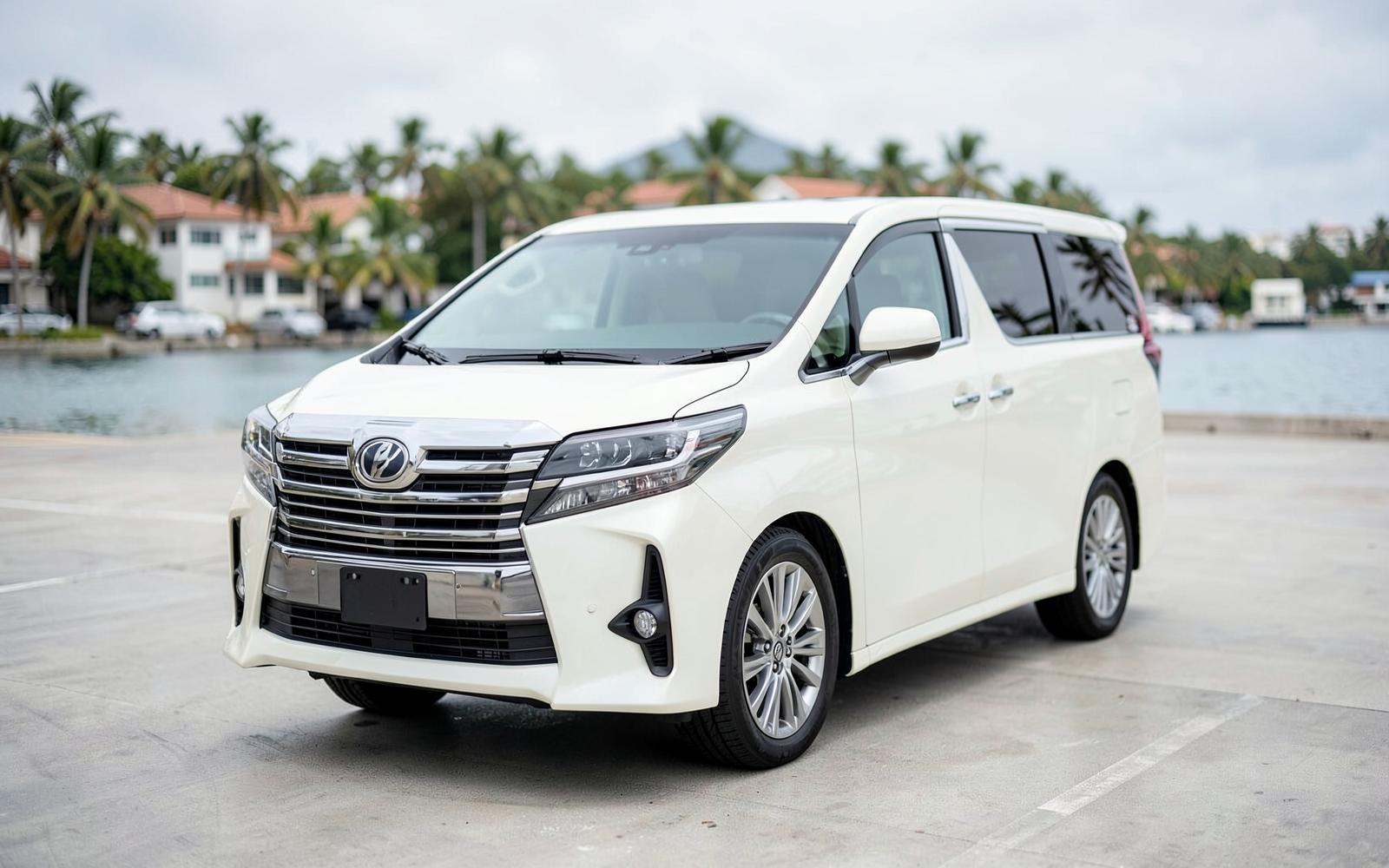 A silver MPV parked outside a car showroom in Mombasa
